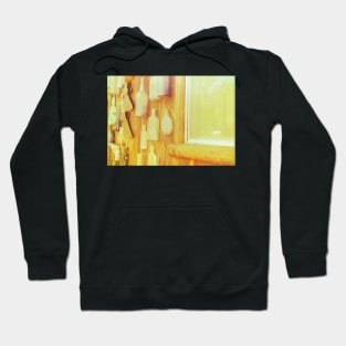 Yellow Bottles Hanging on a Wall Hoodie
